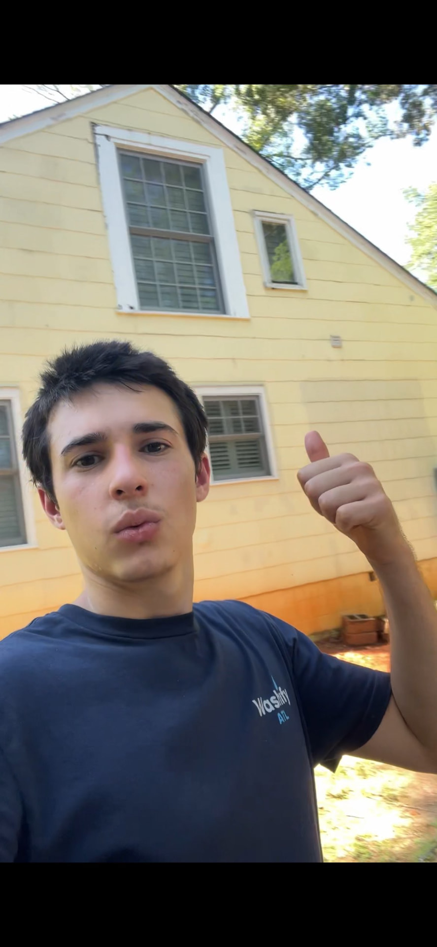 Matteo, founder of WashifyATL, at a local house washing job